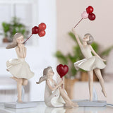 Statua bimba c/ palloncino Gilde
